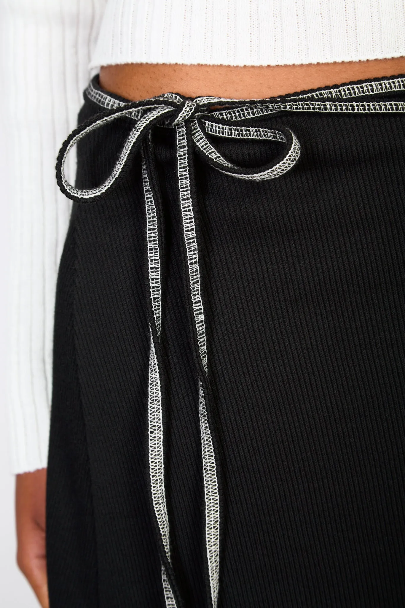 Black jersey and white contrast stitch wrap skirt